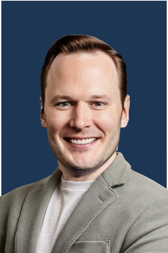 Smiling person in gray blazer on blue background.